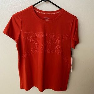 Calvin Klein Women T shit size S/ch/p